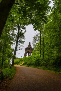 Path to the Emperor Kaiser William Monument through the forest at Porta Stock Photos