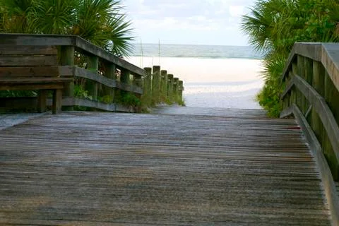 Path to the empty beach Stock Photos