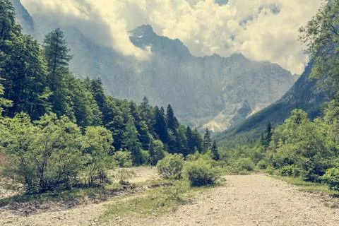 Path going through mountain valley. Stock Photos