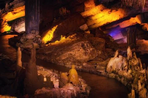 Path inside natural grotto. Big georgian Prometheus cave in located near Ku.. Stock Photos
