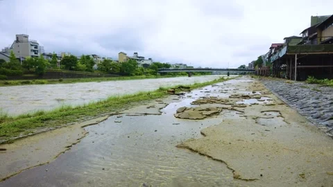 Path of Kamogawa River Ripped from Flood Damage During Typhoon Stock Footage 340179931