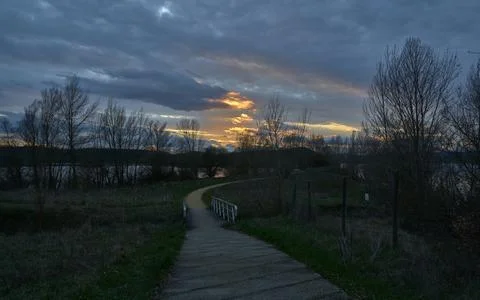 Path to the lake and the sunset Photos