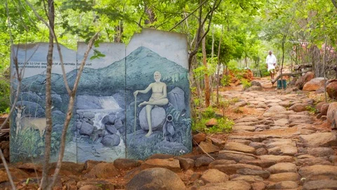 Path leading up to Arunachala holy mountain, Sri Ramana Maharshi sage, India Stock Footage 125494623