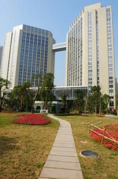 Path leading to buildings Stock Photos