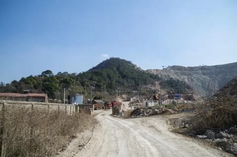 Path Leading to a Construction Site in the Mountain Area Stock Photos