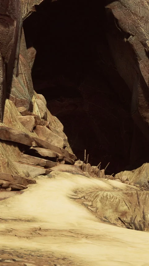 Path leading into dark cave in rocky landscape during daytime Stock Footage 337970578