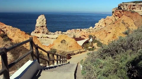 Path leading down to cafe in the cliffs Stock Footage 64469576