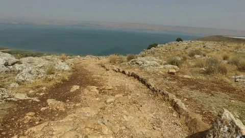 Path Leading Down Mountain Towards Sea Stock Footage 77812127