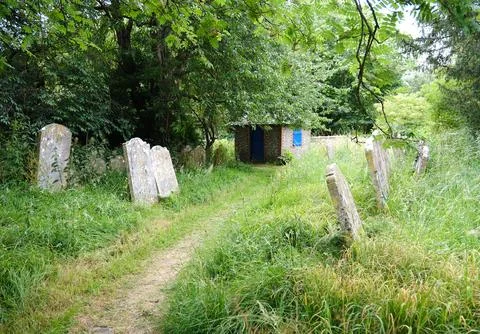 Path Leading to Small Building at St Thomas  Becket Church, Warbl.. Stock Photos