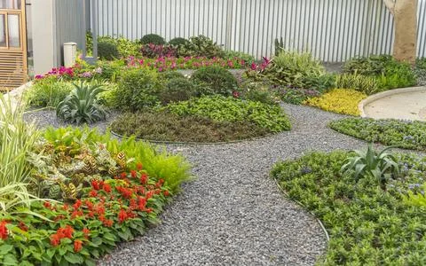 Path leading through a garden Stock Photos