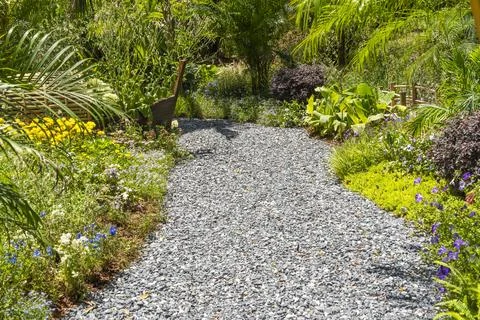 Path leading through a garden Stock Photos