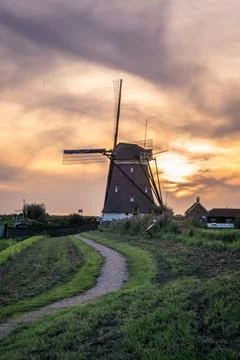Path leading to a windmill Stock Photos