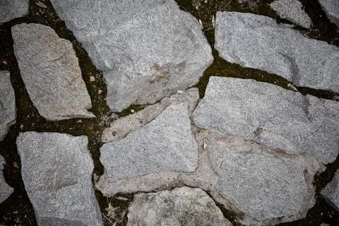 A path of lined stone. Textured background Stock Photos