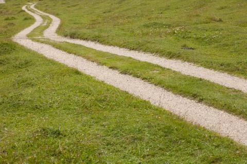 A path long a mountain pasture in Val Gardena Stock Photos