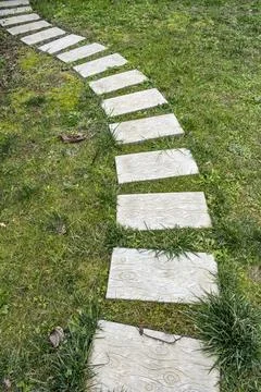 A path made of stone and grass Stock-Fotos