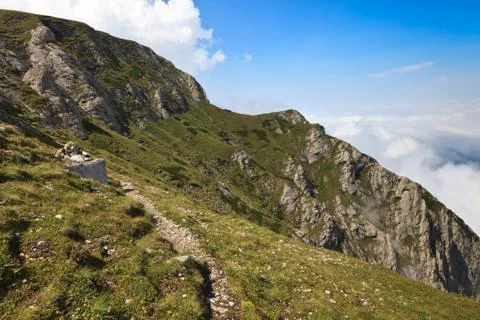 Path on a mountain slope Stock Photos