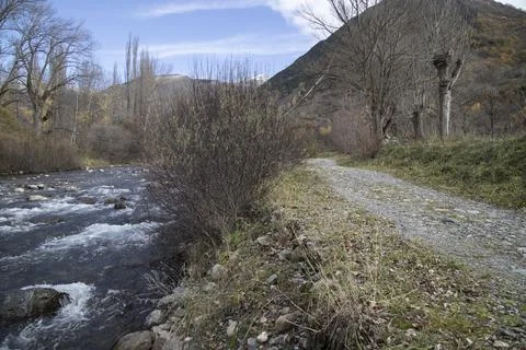 Path next to a river in Boi Valley in Catalonia Stock Photos