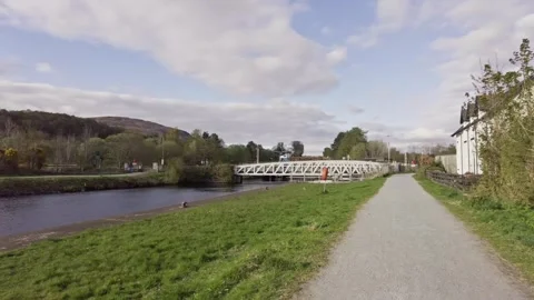 Path next to a river in Scotland Stock Footage 246630267