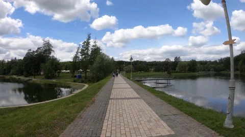 Path in the park between two lakes	 Stock Footage 149318236