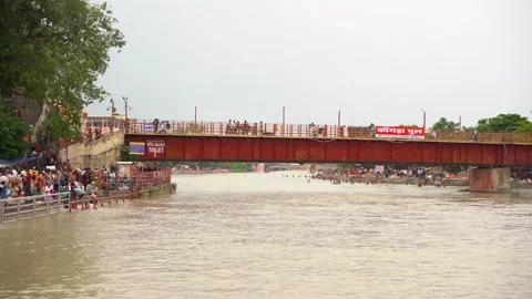 The Path of Pilgrimage: People Crossing Haridwar Iconic Bridge Video stock 315285545