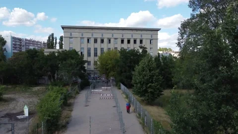 Path for the queue of the technoclub. Perfect aerial view flight berlin Stock Footage 220071298