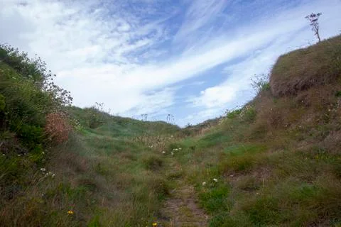 A path to a rockey beach Stock Photos