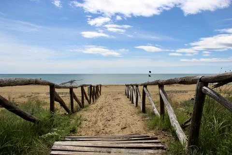 Path to Sandy Beach and Blue Sea Stock Photos