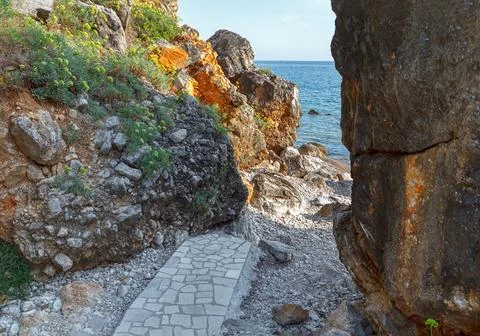 Path to the sea between the rocks Stock Photos