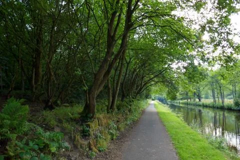 Path on the side of a canal at Cromwell down nature reserve Stock Photos