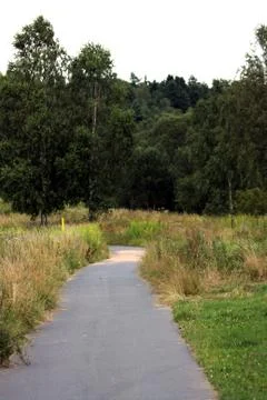 Path on summit of mountain leading Stock Photos