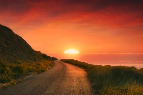 Path to the sun at red sunset Stock Photos