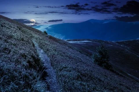 Path though mountain hills and ridge at night Stock Photos