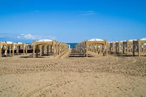 Path through empty beach cabanas. 写真素材