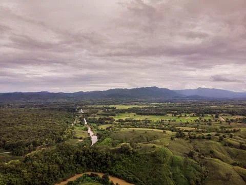 Path through the green forest and countryside of Thailand, Top view aerial ph Фото