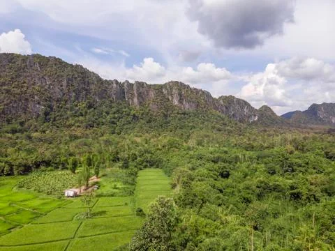 Path through the green forest and countryside of Thailand, Top view aerial ph 写真素材