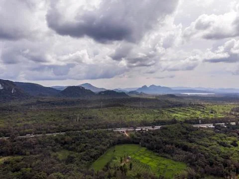 Path through the green forest and countryside of Thailand, Top view aerial ph Фото