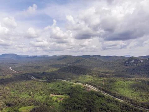 Path through the green forest and countryside of Thailand, Top view aerial ph Фото