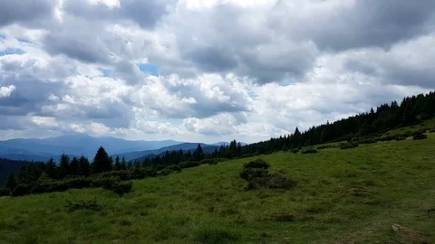 Path through the high mountain peaks and hills landscape, green mountain scenery Stock Footage 81631100