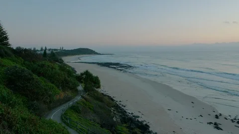 Path through hills along beach at sunrise Stock Footage 86463067