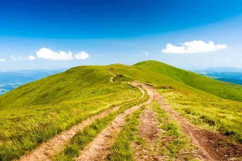 Path through mountain landscape Stock Photos