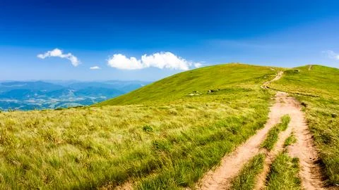 Path through mountain landscape Stock Photos