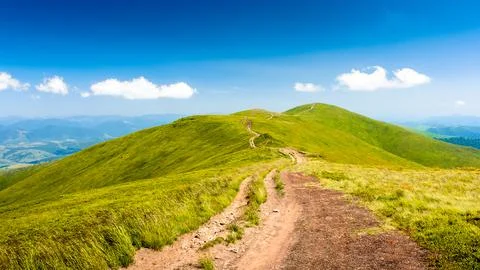 Path through mountain landscape Stock Photos