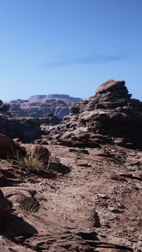 Path through rocks in a desert landscape on a clear sunny day Video stock 340886740