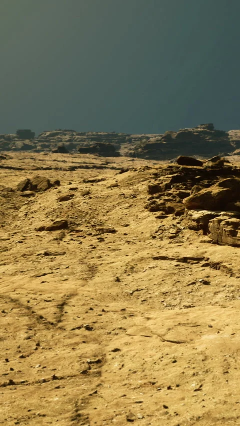 Path through rocky terrain on a sunny day in a desert landscape Video stock 331674989