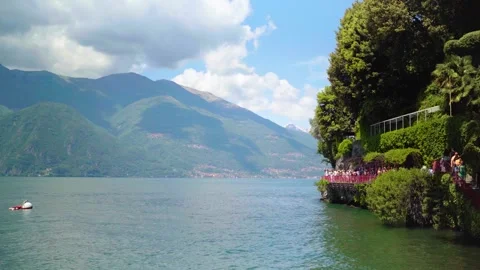 Path for tourists at Lake Como with Mountain and Alps in Italy Stock Footage 277256099