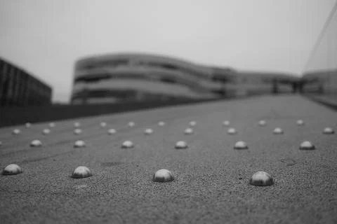 Path on the triangular meadow, accessible roof, blurred background, black and Stock Photos