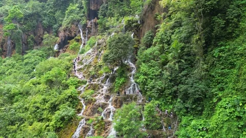 Path to Tumpak Sewu waterfall through many smaller waterfalls on Java Island. Vídeos de archivo 332716496