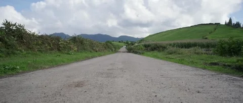 Path on the way to Hike through the Twin Lakes Lagoon in a volcanic crater Stock Footage 320975969