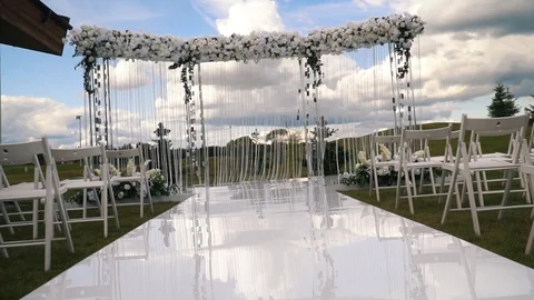 Path to wedding registration arch with floral decoration Stock Footage 120776149
