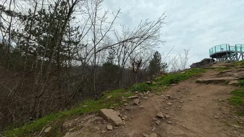 Path winds upward through wild greenery. Vucjanka Canyon, Serbia Видео 332170232